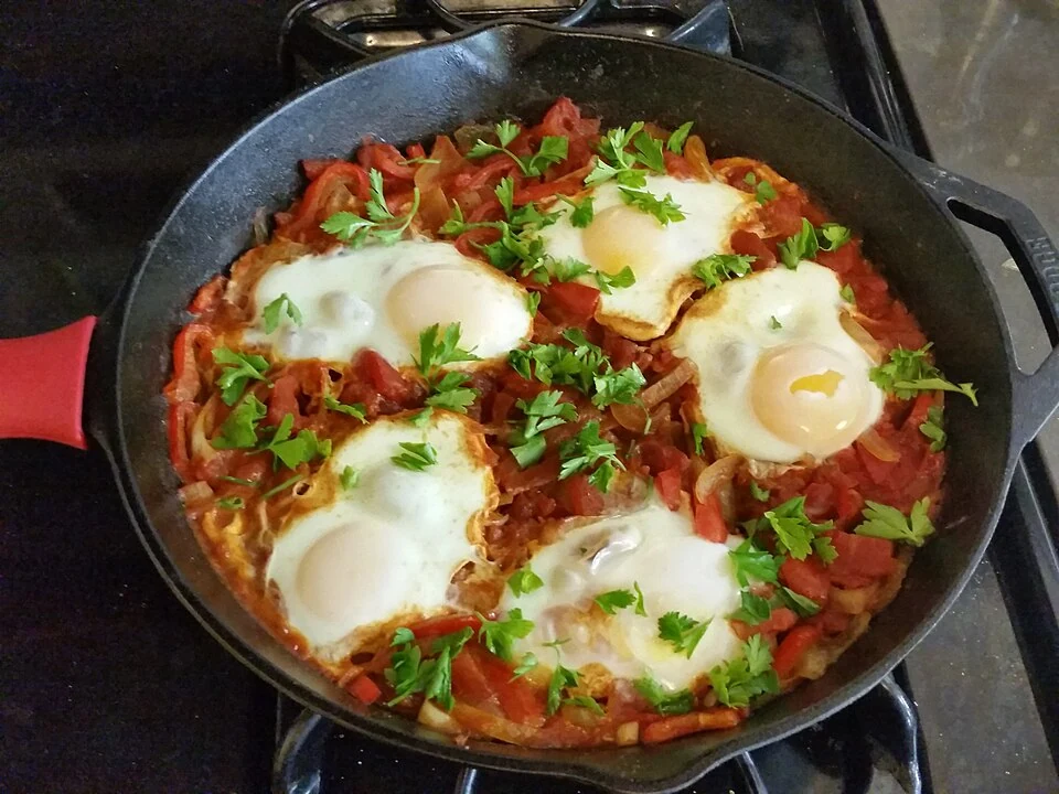 Tomato and pepper eggs — real photograph
