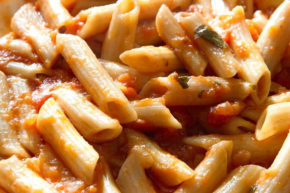 Tomato and basil pasta — real photograph